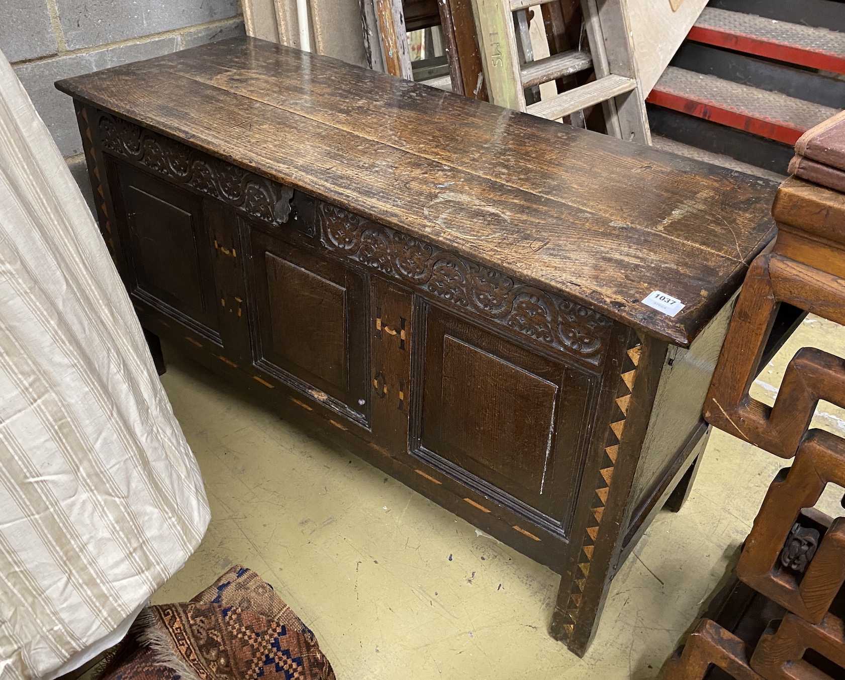 An early 18th century oak coffer, dated 1701, length 127cm, depth 48cm, height 71cm